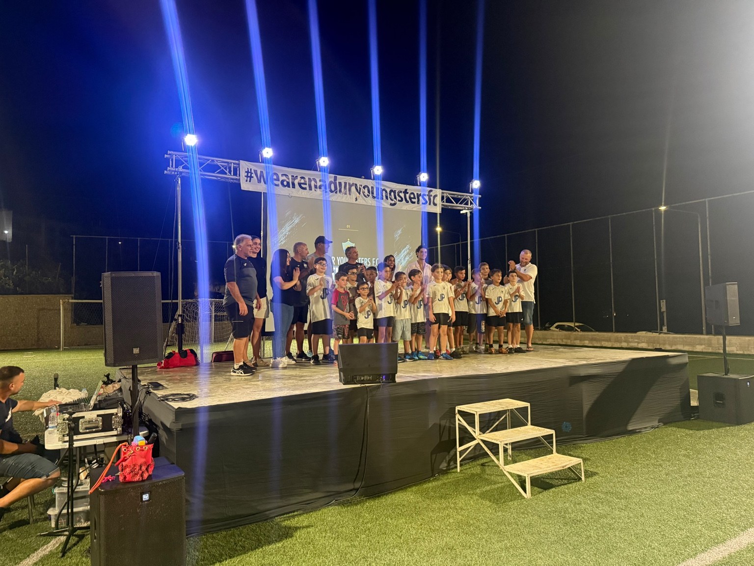 Nadur Youngsters academy group on stage